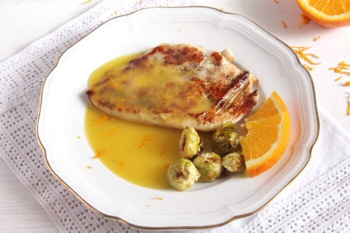 Dinners with chicken breast with orange sauce