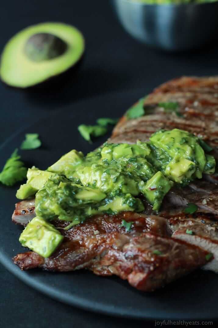 #23 Juicy Grilled Flank Steak topped with a fresh Avocado Chimichurri